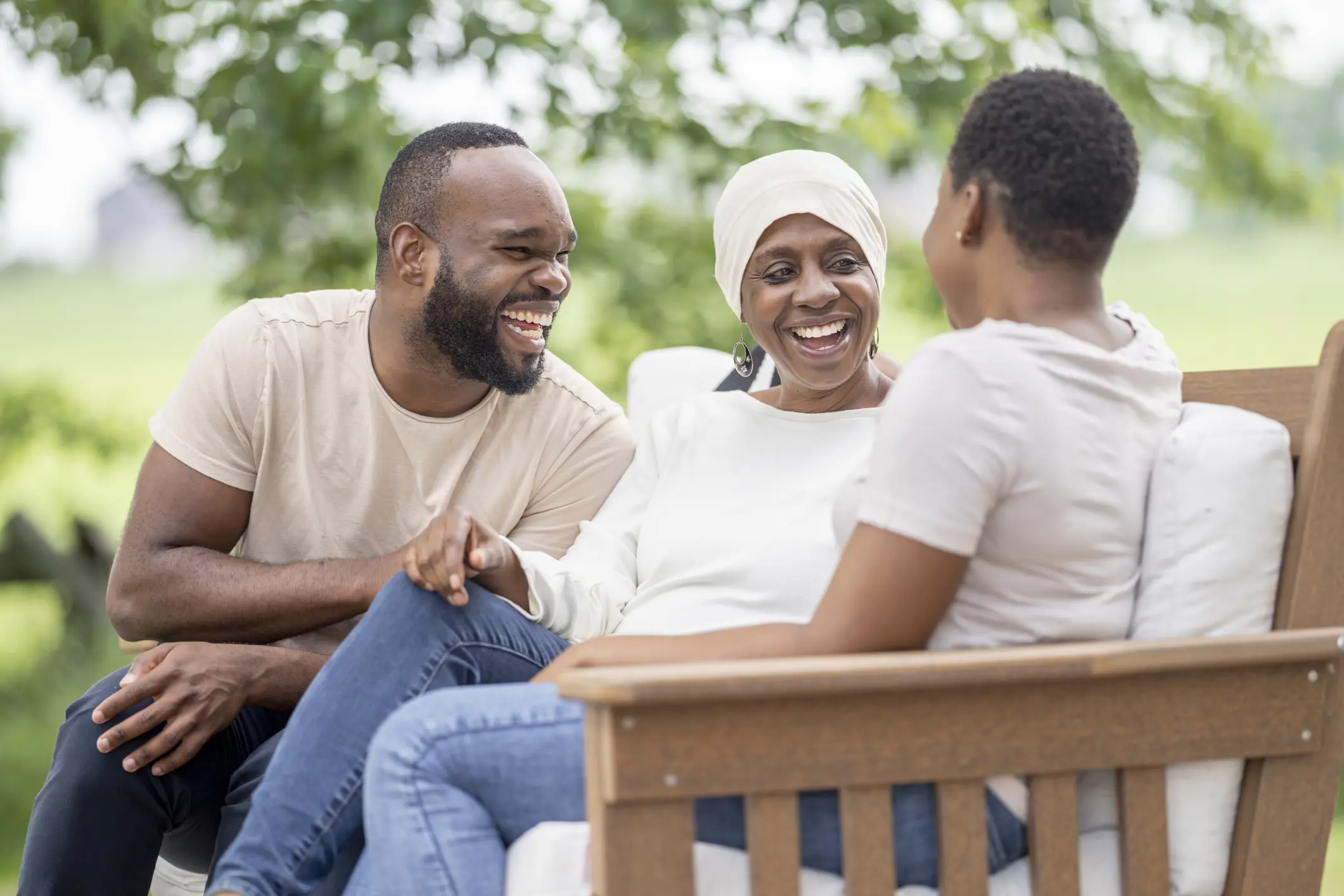 A group of people sitting on a bench