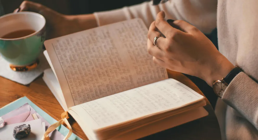 hand flipping the page of a book