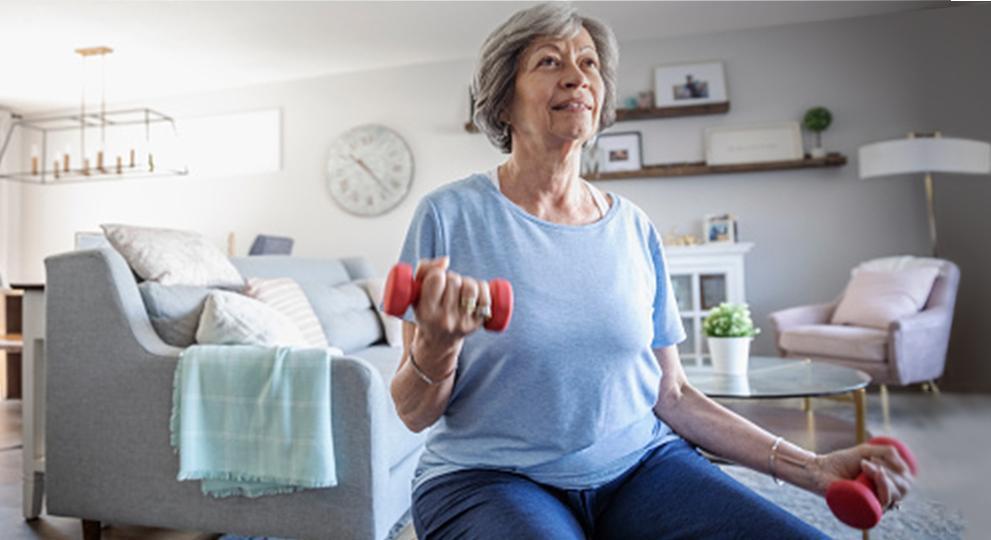 older adult woman doing bicep curls